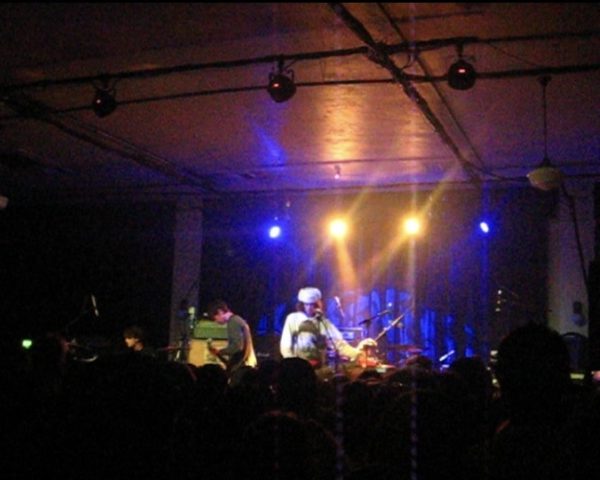 Midrift performing onstage. 